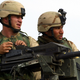 US forces man a mounted MK19 40mm grenade launcher in Afghanistan, 2003.